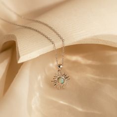 🕑Last Chance: Hurry and save 40% 🕑 Bohemian and dreamy is our Opal Sun Necklace. With a prismatic Opal gemstone in the middle of a detailed sun pendant, this dainty necklace is a perfect jewelry gift for someone who brightens your day. Material: High Quality Solid 925 Sterling Silver Finish: 18K Gold Featuring ~12mm Sun Pendant and an ~3.5mm Opal Gemstone on a dainty Cable Chain, adjustable from 16 to 18 inches Part of our Opal Collection Model showcases a bohemian, layered look featuring our Sterling Silver Sun Design Spiritual Necklace, Minimalist Sterling Silver Jewelry With Sun Design, Elegant Sterling Silver Sun Design Jewelry, Celestial Sterling Silver Necklace With Sun Design, Bohemian Sun Shaped Jewelry Gift, Sterling Silver Bohemian Necklace With Sun Design, Bohemian Sterling Silver Necklace With Sun Design, Elegant Sun-shaped Jewelry For Gifts, Elegant Sun-shaped Jewelry Gift