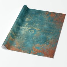 an old, rusted metal surface with blue and orange paint on it wrapping paper