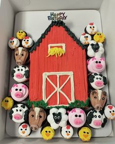 a birthday cake made to look like farm animals