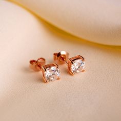 💫 Moissanite Stud Earrings, Moissanite earrings, Earrings for women, Stud earrings, Women earrings, women studs, 6mm studs, rose gold earrings 💫 Subtle enough for every day but with more than sparkle to carry you through an evening or a special occasion, these rich Alexandrite earrings will a beautiful shimmer to any outfit.  💫 Made with 24K high polished gold, they are perfect for spicing up your everyday look.  💫 The earrings have a push back closures and are easy to wear  Material: High-Quality Solid 925 Sterling Silver  Gemstone: Lab Created Moissanite Stone Size: 6MM  Total length: 9MM The product is in an elegant box to be packaged, ready to give a gift ❤️ 💫All rings are created by our craftsmen using a unique creation process. 💫Dainty and light and so pretty 💫 High-quality ma Rose Gold Earrings With Vvs Clarity For Gift, Rose Gold Earrings With Vvs Clarity As A Gift, Rose Gold Earrings With Brilliant Cut As Gift, Rose Gold Diamond Cut Round Earrings, Rose Gold Brilliant Cut Earrings As Gift, Rose Gold Brilliant Cut Earrings For Gift, Rose Gold Round Cut Earrings For Formal Occasions, Rose Gold Brilliant Cut Cubic Zirconia Earrings, Formal Rose Gold Round Cut Earrings