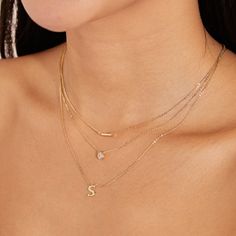 Simple, classic, gold. Everyone needs an initial necklace! This classic style pairs well with just about anything. Wear it by itself or layer it with other styles to really elevate & personalize your look. Made with 925 recycled sterling silver and plated with fine 14k gold for a brilliant shine and luxurious feel. We finish all of our sterling silver jewelry with a specialized coating to help prevent tarnishing and add longevity to your favorite piece. Our chains measure 16" with a 3" extender Dainty Initial Pendant Necklace For Layering, Classic Sterling Silver Initial Necklace With Delicate Chain, Everyday Yellow Gold Initial Necklace, Fine Jewelry Initial Pendant Necklace For Everyday, Everyday Diamond Initial Pendant Necklace, Everyday Fine Jewelry Initial Pendant Necklace, Everyday Fine Jewelry Initial Necklace, 14k Gold Initial Necklace With Clavicle Chain For Everyday, 14k Gold Clavicle Chain Initial Necklace For Everyday