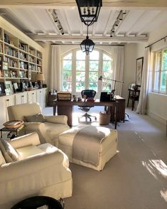 the living room is clean and ready for guests to use it as a study area