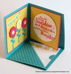 an open card with flowers on it and the words sunshine in pink, yellow and blue