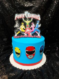 a birthday cake with the power rangers on it