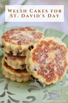 three pancakes sitting on top of a green plate