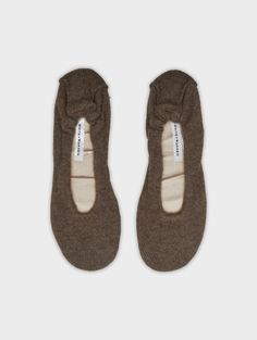 These cashmere ballet slippers have a comfy, cushioned sole and an elastic trim that stays put. Perfect for lounging around the house, pair with our matching robe and eye mask for the most luxurious night's sleep. Details 100% Cashmere. Wipe clean only. Style #20554 Cashmere Robe, Cashmere Travel Wrap, Matching Robes, Comfy Slippers, Ballet Fashion, Ballet Slippers, Wrap Cardigan, Wrap Sweater, Sweater Sale