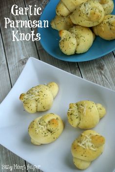 garlic parmesan knots on a white plate