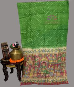 Hand Painted Bandhani Tussar Silk Saree, adorned with hand-painted designs with fine hand strokes.. Crafted with premium Tussar fabric and colored with natural dyes, it's sustainable and luxurious. Complete with fall and pico, and a fully stitched blouse, this saree is ready to flaunt your style with grace. Product: Hand painted bandhani Tussar Silk Saree Saree Color: green Saree Fabric: Pure Tussar colors may be slightly different because of the lighting,and  shades Multicolor Batik Print Saree For Festive Occasions, Festive Multicolor Batik Saree, Bollywood Style Traditional Wear With Batik Print In Chanderi, Festive Bollywood Saree With Batik Print, Unstitched Batik Print Traditional Wear For Navratri, Multicolor Batik Print Saree For Festive Season, Traditional Art Silk Saree With Batik Print, Festive Multicolor Batik Print Saree, Bollywood Style Batik Print Traditional Wear For Navratri