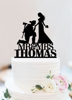 a wedding cake topper that says mr and mrs