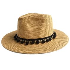 This stylish summer fedora is a must-have for any wardrobe. Its lightweight and packable material makes it great for travel, providing a fashionable way to block harsh sun and enjoy summer days. With an attractive pom-pom accent, this straw hat will be the perfect addition to your outfit. Stay fashionable in the sun with the Pom Pom Fedora Hat. The straw sun hat features a pom pom for eye-catching style, perfect for accentuating your summer look. This stylish accessory is the perfect way to add a bit of personality to your outfit. 100% paper straw. Measurements Brim: 2.76in / 7cmCircumference: 22in / 56cm Summer Fedora, Straw Sun Hat, Sun Hats For Women, Enjoy Summer, Pom Pom Hat, Fedora Hat, Sun Hat, Straw Hat, Stylish Accessories