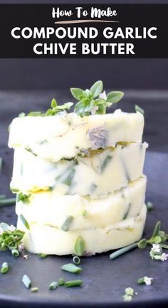 three pieces of soap sitting on top of each other with leaves and herbs around them