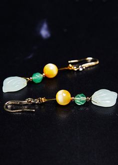 Unique Naturally Jade And Beeswax Drop Earrings925 Silver.Made of fine Jade Beeswax.Measurement: 6cm/2.34" * 1.2cm/0.468". Matches easily with daily hairstyle, dresses & Shirts Daily Hairstyles, Jade, Drop Earrings, Beads, Hair Styles, Silver, Dresses, Nature