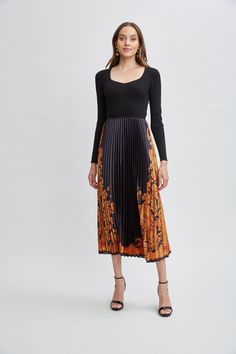 Our effortless Pleated Midi Dress has a distinct modern vibe. The sweetheart neckline viscose sweater knit bodice combines with an artistic scarf print. Definitely poetry in motion! Mixed Media Pleated Print Midi Dress with Long Sleeve Ribbed Knit Mock Neck Bodice Bodice: 60% Polyester, 30% Nylon 10% Spandex; Skirt: 100% Polyester Runs True to Size Model is 5'9" and wearing size S Measurements: 50"L Shoulder to Hem (approx. measurement for size S) Imported Style #: ETR44366 Tahari Dress, Print Midi Dress, Long Sleeve Short Dress, Pleated Midi Dress, Modern Vibe, Printed Midi Dress, Denim Coat, Sweater Knit, Knit Jacket