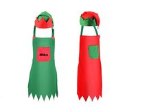 two aprons with red and green handles