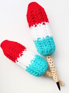 two crocheted red, white and blue toothpicks