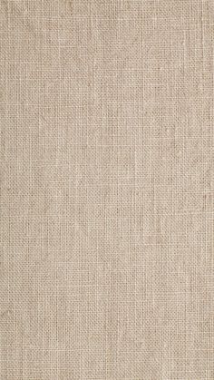 a beige fabric textured with small squares and lines, as well as an area for text