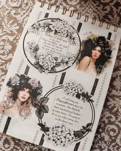 an open notebook with pictures of women on it and flowers in the middle, sitting on a lace tablecloth