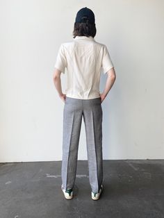 A pair of 1990s grey suit pants. Straight leg- mid rise. Zipper and latch button closure at waist. Brand is colter Waist 28 rise12 hips inseam 28 outer39.5 Grey Suit Pants, Cream Wool Coat, Grey Pant, Sherpa Vest, Grey Suit, Gray Suit, Small Photos, Suit Pants, Grey Pants