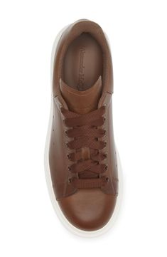 A chunky rubber platform elevates this lace-up sneaker with a removable, padded insole that provides signature comfort. 1 1/2" heel, 38mm (size 43MI) Lace-up style Removable, cushioned insole Leather upper/textile and leather lining/rubber sole Made in Italy Designer Shoes Modern Custom Lace-up Sneakers With Textured Sole, Brown High-top Platform Sneakers With Laces, Sporty Leather Lace-up Platform Sneakers, Modern Chunky Sneakers With Lug Sole, Modern Chunky Sneakers With Lug Sole And Round Toe, Brown Lace-up Platform Sneakers For Streetwear, Lace-up Platform Sneakers With Contrast Sole, Brown Platform Sneakers With Laces And Round Toe, Brown Sneakers With Lug Sole For Streetwear