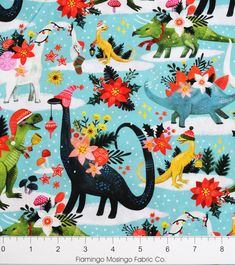 a blue background with dinosaurs and flowers on it