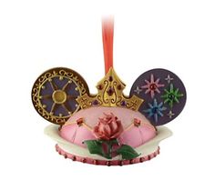 a disney ornament with a rose on it