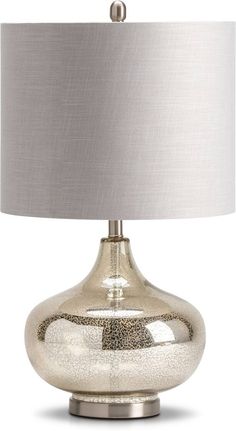 a silver table lamp with a white shade on the bottom and a light grey shade on the top