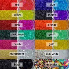 several different colors of beads in plastic containers