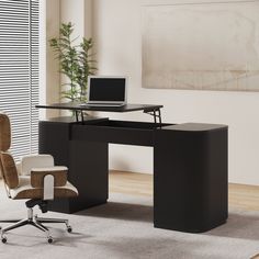 an office desk with a laptop on it and a chair in front of the desk