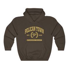 A college style hoodie sweatshirt representing Stardew Valley's Pelican Town All sweatshirts are printed to order and take 2-7 business days for fulfillment. More about the sweatshirt: This soft sweatshirt has a loose fit for a comfortable feel. With durable print, it will be a walking billboard for years to come. .: 50% Cotton 50% Polyester .: Medium-heavy fabric (8.0 oz/yd² (271.25 g/m .: Loose fit .: Sewn in label .: Runs true to size Stardew Valley Shirt Guide, Stardew Clothing, Clothing Stardew Valley, Stardew Valley Merch, Stardew Valley T Shirt, Baggy Hoodie, Style Hoodie, Stardew Valley, College Fashion