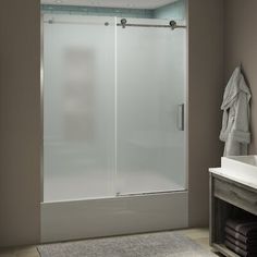 a bath room with a sink and a shower