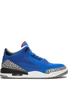 the air jordan 3 is in blue and white with leopard print on the upper part