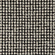 black and white checkered fabric with small dots