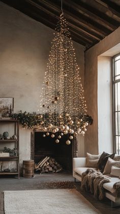 a living room filled with furniture and a large chandelier hanging from the ceiling