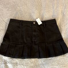 Black Pleated Mini Skirt With Zipper And Button Closure. Purchased At Ruby & Jenna. Nwt. Black Pleated Mini Denim Skirt, Black Mini Denim Skirt With Button Closure, Casual Black Skort With Button Closure, Black Pleated Mini Skirt, Pleated Mini Skirt, Womens Skirt, Mini Skirts, Zipper, Women Shopping