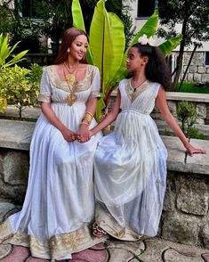 Experience the understated elegance of this modern Ethiopian Habesha dress, designed with a simple yet captivating silhouette. Its clean lines and exquisite craftsmanship create a beautiful and sophisticated look. Perfect for both casual and formal occasions, this dress is a versatile addition to any wardrobe and a testament to the timeless artistry of Ethiopia. Material Cotton Menen Thread Estimated delivery : 2 weeks to 3 weeks Contact WhatsApp +1(304)-306-2784Email: contact@ethiopian.store Chic Festive Maxi Dress For Wedding, Flowy Midi Dress For Wedding Guest, Formal Maxi Dress For Eid, Festive Chic Maxi Length Dresses, Festive Chic Maxi Dresses, Festive Elegant Maxi Dress, Elegant Short Sleeve Dresses For Eid, Festive Maxi Length Dress For Wedding Guest, Sleeveless Wedding Dress For Eid