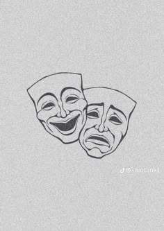 two masks with faces drawn on them