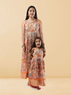 Match style with your little one in our Mommy n Me - Cream Kalankari Print Length Dresses. These charming matching dresses feature a beautiful cream Kalankari print, designed for both mothers and daughters to flaunt together. The comfortable length and soft fabric ensure a perfect fit and ease of movement, ideal for creating lasting memories with your mini-me. Care Instructions: Hand wash in cold water to retain the vibrant print and fabric quality for both dresses. Mothers And Daughters, Mom And Daughter Matching, Mommy And Me Dresses, Print Dresses, Indian Ethnic Wear, Mini Me, Matching Dresses, Leggings Shop, Mommy And Me