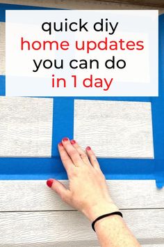 a woman's hand holding up a sign that says quick diy home updates you can do in 1 day