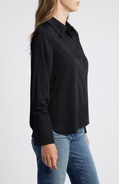 A covered placket and flared sleeve cuffs add a tailored touch to a staple shirt. 25 1/2" length Hidden-button placket Spread collar Long sleeves with flared, one-button cuffs 51% rayon, 45% polyester, 4% spandex Hand wash, dry flat Imported Chic Long Sleeve Blouse With Roll-up Sleeves, Fall Office Blouse With Roll-up Sleeves, Solid Color Blouse With Button Cuffs For Business Casual, Office Blouse With Roll-up Sleeves For Fall, Fall Collared Blouse With Placket, Classic Long Sleeve Blouse With Roll-up Sleeves, Sleek Button-up Fall Tops, Sleek Button-up Tops For Fall, Chic Long Sleeve Blouse With Roll-up Option