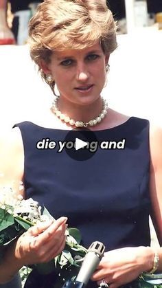 a woman in a blue dress holding flowers and an umbrella with the words die young and old written on it