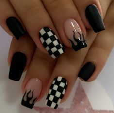 black and white nail designs with flames on the tip of their nails are perfect for this manicure