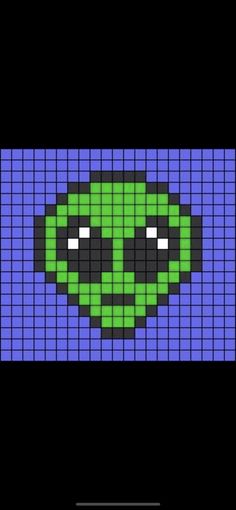 an image of a pixellated pattern with the face of a green alien on it