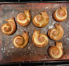 several different types of pastries on a baking sheet