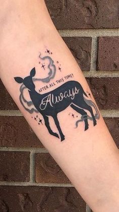 a tattoo on the arm that says, it's all this time and an image of a deer