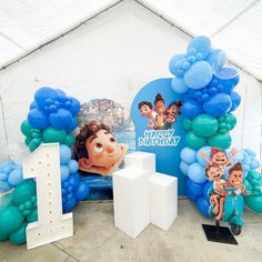 balloons and decorations are set up in the shape of characters for a cartoon birthday party