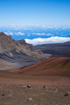 the mountains are covered in clouds and dirt