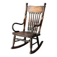 an old wooden rocking chair on a white background