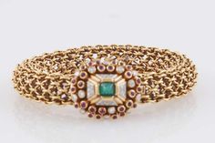 For Sale on 1stDibs - Unique bracelet finely crafted in 18K Yellow Gold with beautiful clasp, centering sugarloaf Emerald, surrounded by cabochon Rubies and diamonds. Signed Wedding Jewellery Designs, Vintage Gold Bracelet, Rubies And Diamonds, Flexible Bracelet, Retro Bracelet, Ruby Bracelet, Gold Link Bracelet, Emerald Bracelet, Antique Bracelets