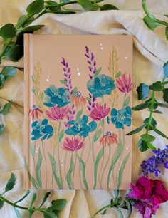 Hand painted watercolor journal. The journal has a hard cover and eighty dotted pages, with an attached ribbon bookmark. this is a great book for writing, drawing, or a one of a kind gift. Travel Journal Cover, Scrapbook Cover, Diary Covers, Hand Painted Cat, Cover Journal, Watercolor Journal, Writing Drawing, Field Of Flowers, Dotted Page