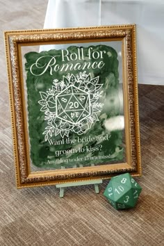 a green dice sitting on top of a wooden floor next to a sign that says roll for romance